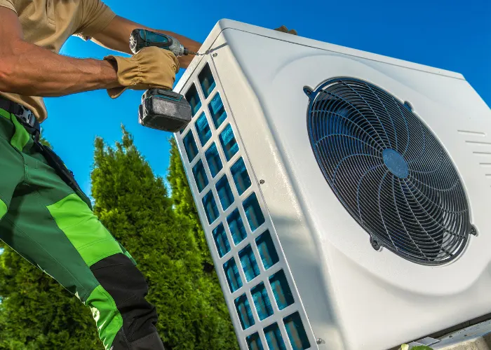 An AC system being installed by an HVAC technician